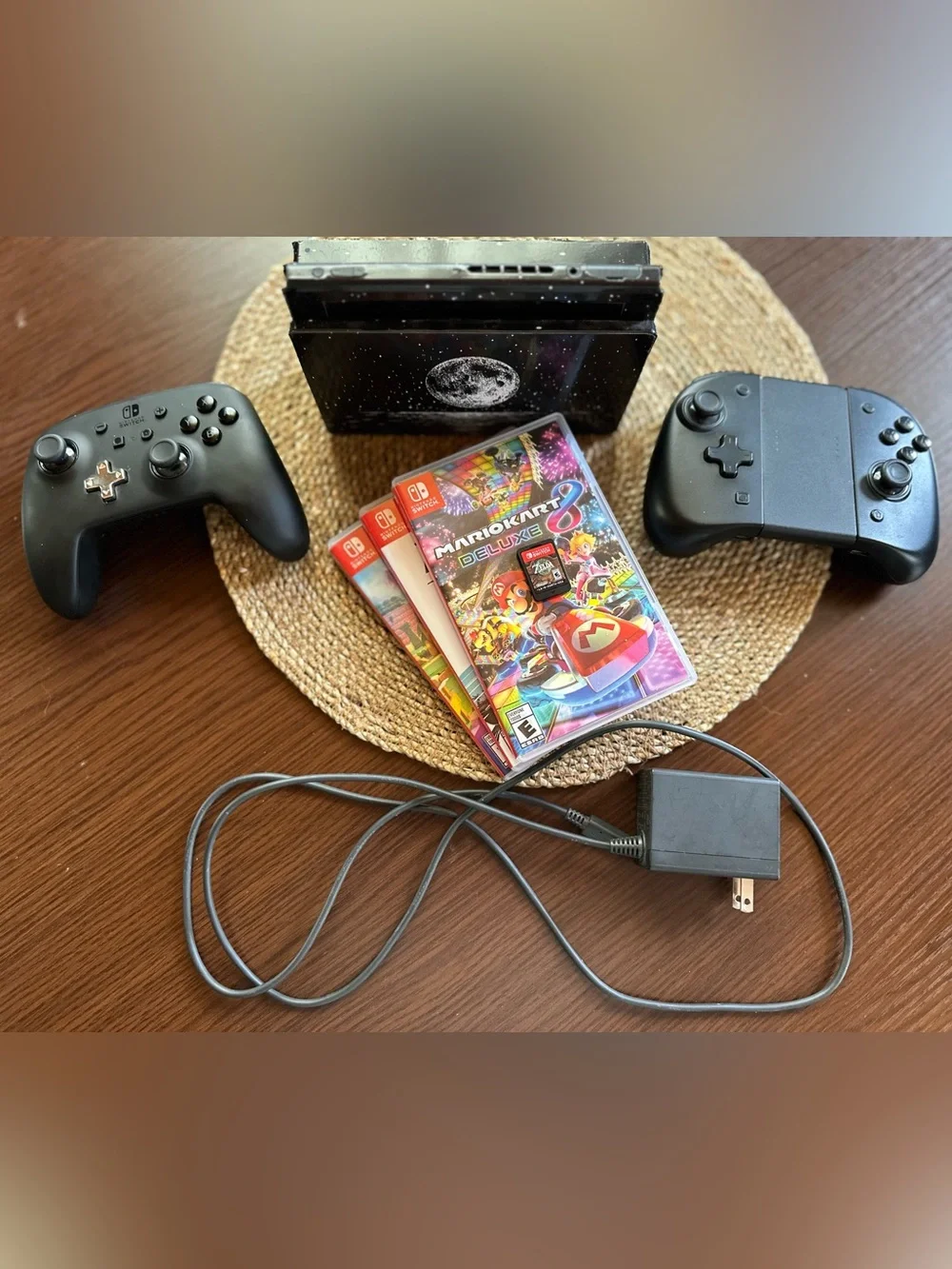 Nintendo Switch Bundle in Black with Moon Dock and Two Pro Controllers